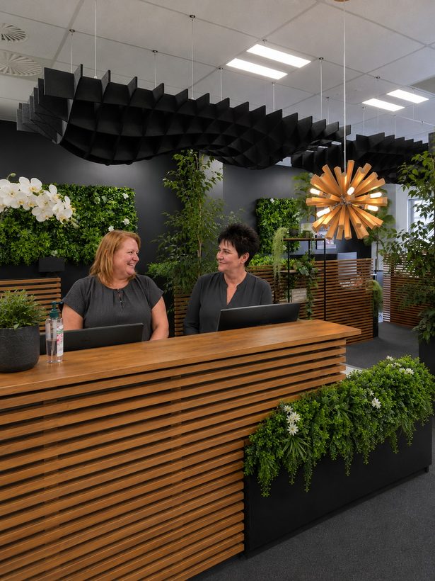 Seed receptionists at the front desk answering calls